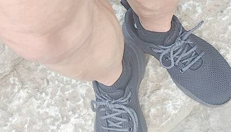 TRying out new black sneakers