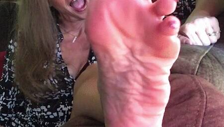 WRINKLED SOLES REST ON SOFA