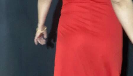 Smoking in long red dress