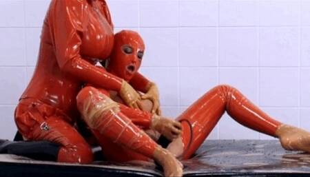 Rubber vac-bed breath play session with two latex piss lesbians - Part 2 of 2