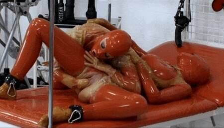 Perverted lesbian piss sluts in red latex outfits - Part 2 of 4 - Fat dildo and rubber fist in wet pussy