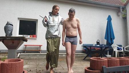 Lady Donata  in a silver K-WAY raincoat pisses on her slave - 82