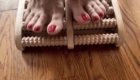 Wood foot massager close up massage, ong toes, wrinkly soles, red nails, milf feet