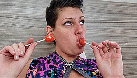 Slowly Sucking On Two Blow Pops (4K - UHD 2160p MP4)