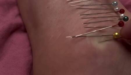 sticking needles in my feet
