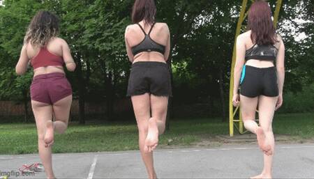 measuring and showing the difference between big and small feet between 3 girls