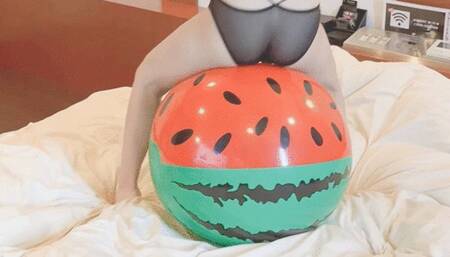 Crack a watermelon beach ball with your butt