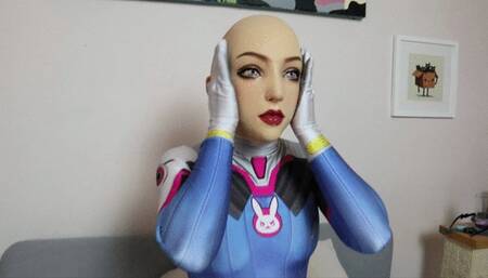 Silicone Doll in Dva Plugsuit Blindfolded, Gagged, with Tubes Inserted as Pussy Vibrated