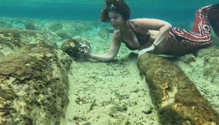 Carissa in her multiple underwater forms