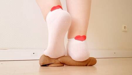 Trampling in white socks