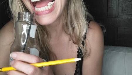 Chewing gum and sucking on pencil