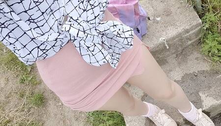Pink skirt and blue panties outdoor wetting peeing