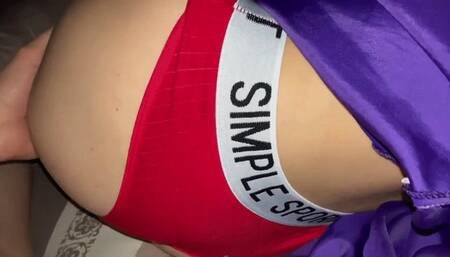 Girl in red panties spreads her legs