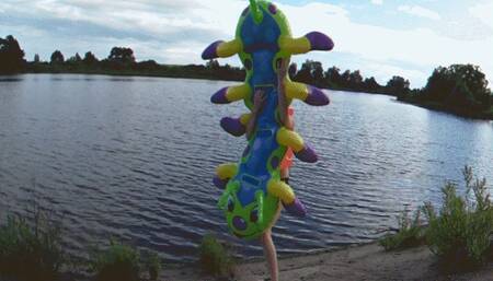Alla blows away a rare inflatable caterpillar on the shore!!!
