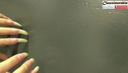 nails leave scratches on a metal door