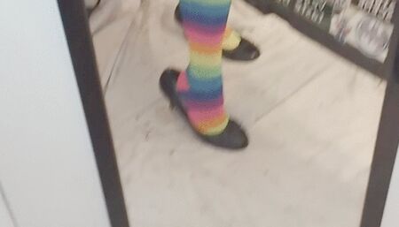 Tempest showing off in rainbow stockings Happy Pride