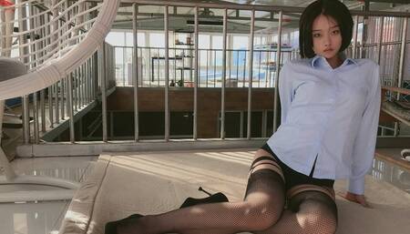 cute girl in fishnet stockings