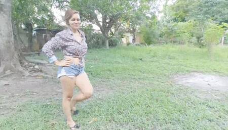 Stephanie sexy foot teasing in the mud on flip flops