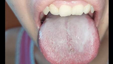 admire my white tongue very close to the camera