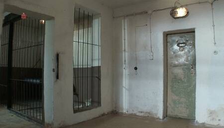 Pretty blonde girl chained to the floor to be bullied