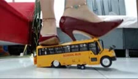 crushing a schoolbus with my red and black stilettos