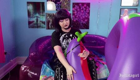 Vampire Girl Wrestles With Pet Inflatable Snake