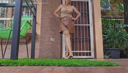 Milah Arches leather skirt and nude Pantyhose teasing