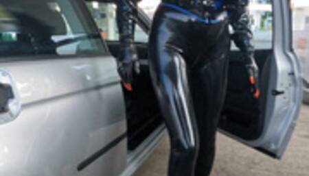Latex catsuited girl with huge tits visits gas station in public PART 2