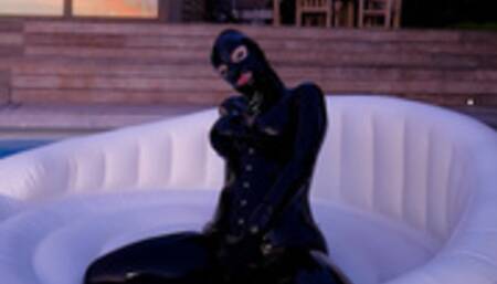 Cristal Kinky rubber doll playing outdoors