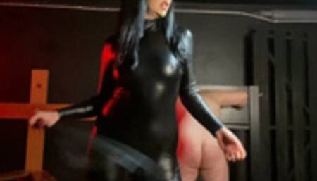Femdom hard whipping in leather catsuit