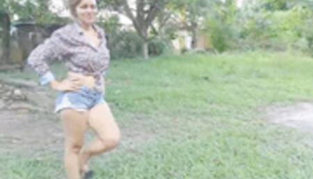 Stephanie sexy foot teasing in the mud on flip flops