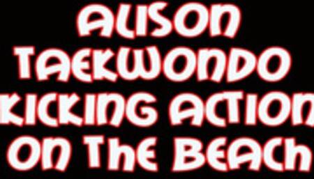 Alison taekwondo kicking action on the beach