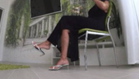 Dangling and toe topping in new white sandals Mb