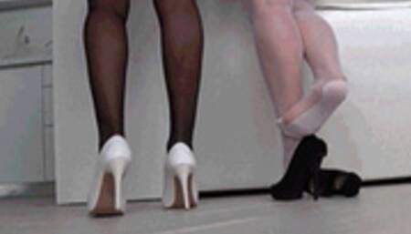 Dipping in black and white high heels AD