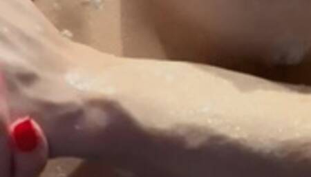 Hot blond taking a shower