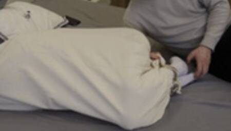 XY Bondage 92 - Sexy Chinese girl is bonded in a bag and scratches her feet