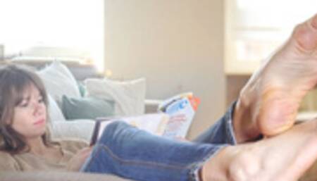 Teresa shows off her feet and soles on the couch reading a magazine - 12126 - 4K video