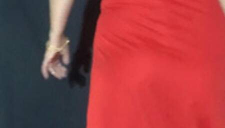 Smoking in long red dress