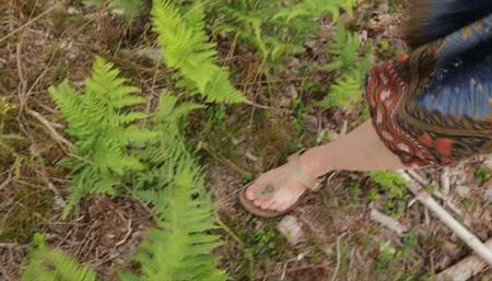 Nature-girls dirty feet enjoy wind, rain, mud and stones (natural sound version - no music)