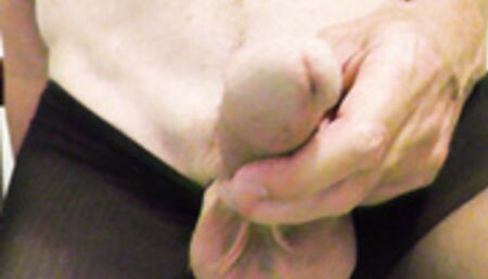 Gay DILF Richard Lennox's big cock in pantyhose