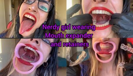 Nerdy girl wearing mouth expander and retainers