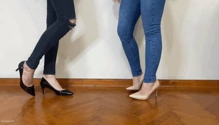TWO GIRLS WEARING HEELS STEPPING ON EACH OTHER’S FEET - MOV Mobile Version