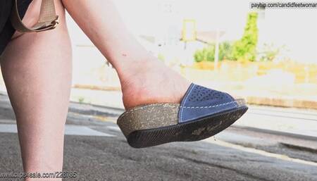 Woman beauty feet in sandals mules, near to feet, candid coworker foot fetish examination series