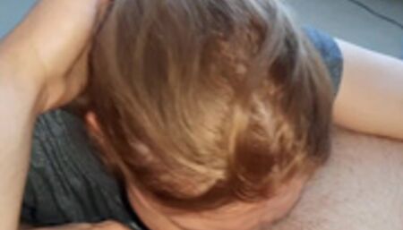 The step-sister gives a deep blowjob to her brother who has just arrived