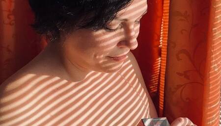 Topless smoking by the window, smelling my own cigarette smoke