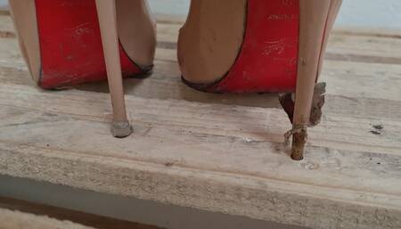 Kat Sinks Her Sharp Louboutins into a Wooden Pallet