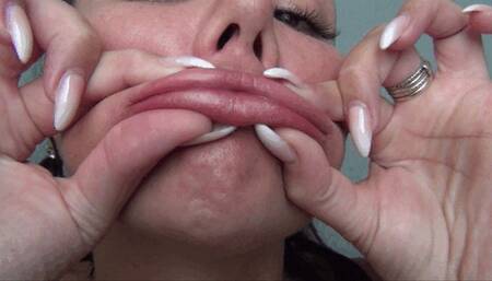 Stretching and pursing my lips La