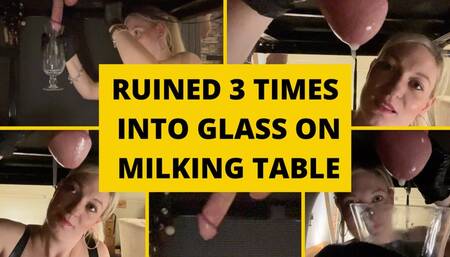 Close up ruined multiple times into a glass on the milking table
