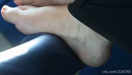 Brat girl with her barefeet on train seat, candid foot fetish