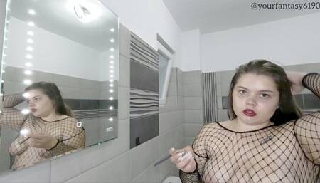 Sexy smoker in fishnets